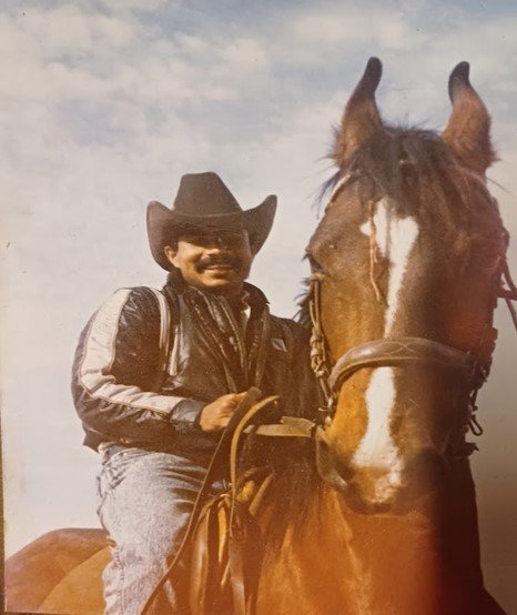 indian tour guide riding horse during adventure travel experience