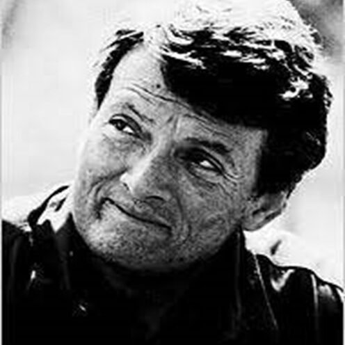 Black and white portrait of author Alexander Frater, known for 'Chasing the Monsoon' and his travels to Ladakh.