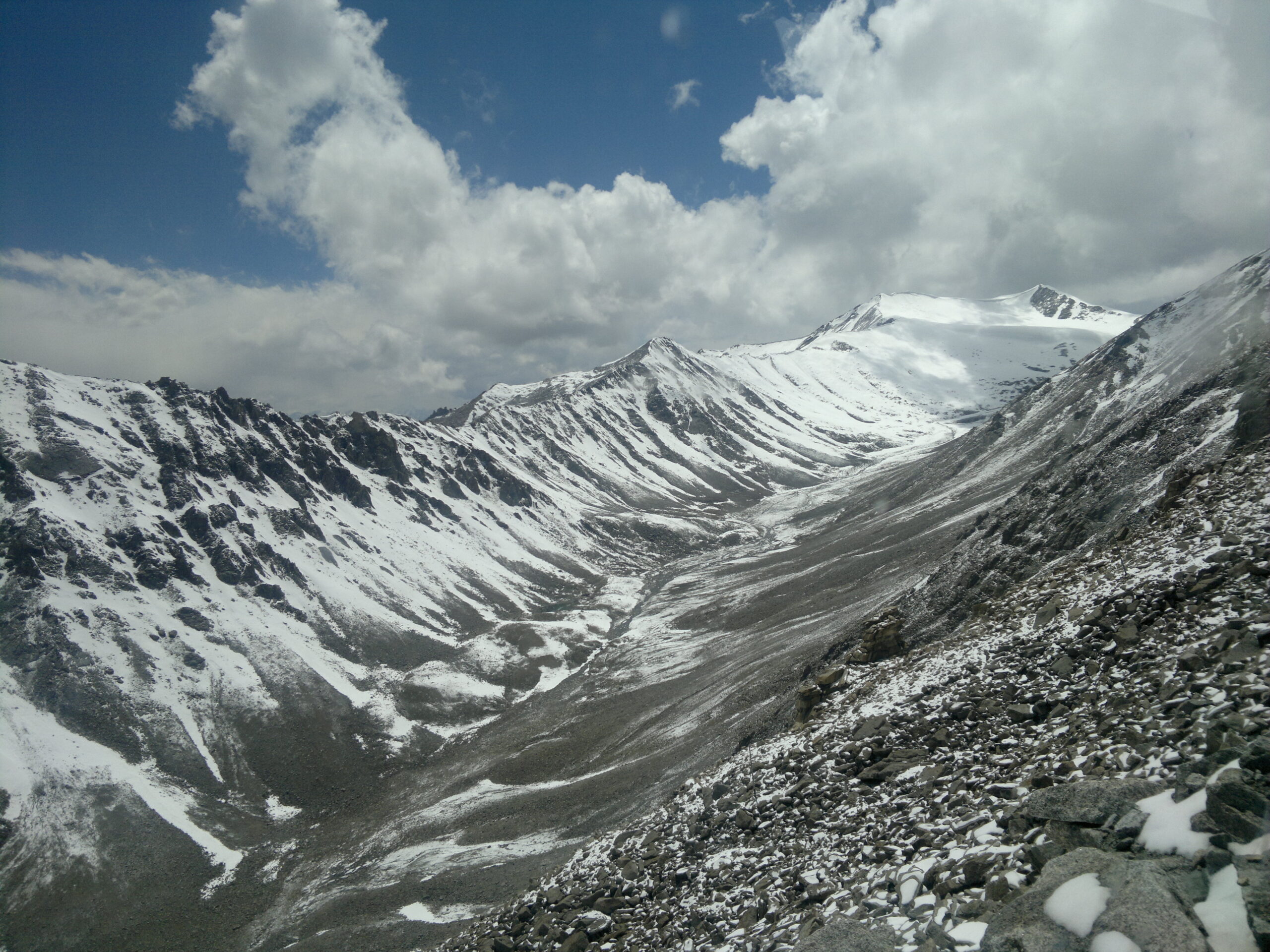 snow covered mountains with white landscape and clear sky in Himalayan region