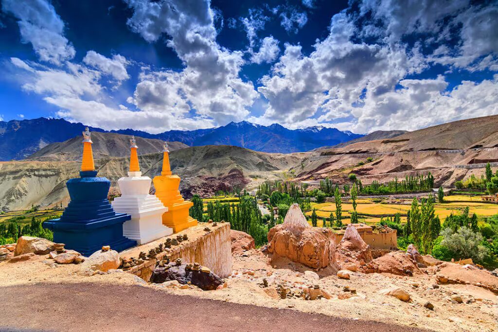 Scenic view of Leh Ladakh mountains with travelers exploring high-altitude landscapes