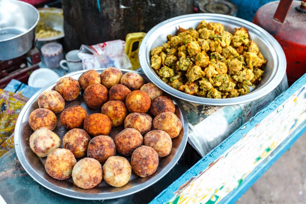 Cultural tour travelers exploring traditional Indian heritage sites