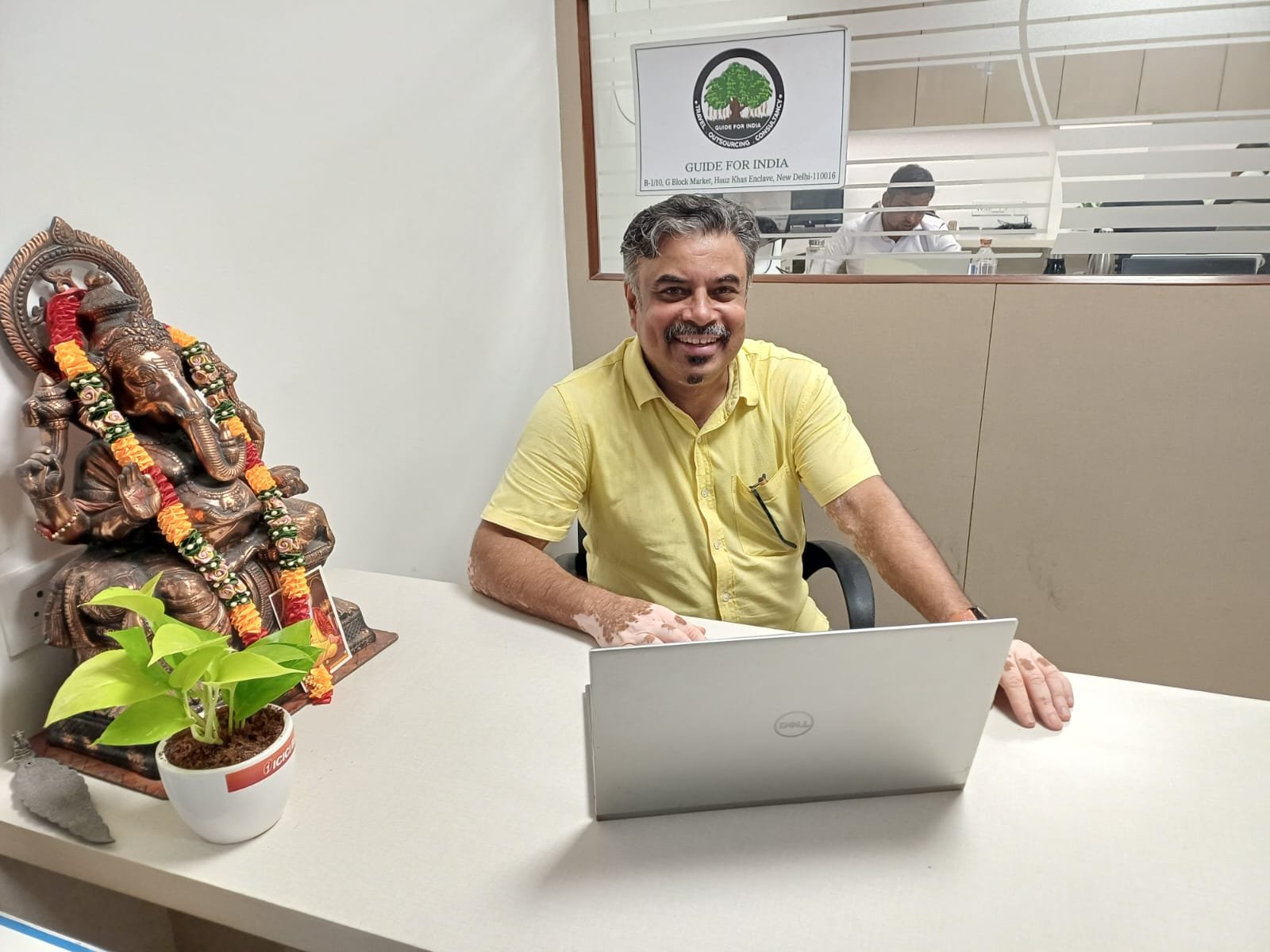 Ramesh Nambiar, private tour guide in India, working at the Guide For India office in New Delhi.